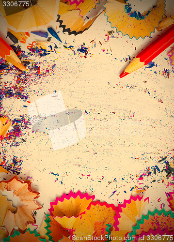Image of colored pencil shavings and copy space