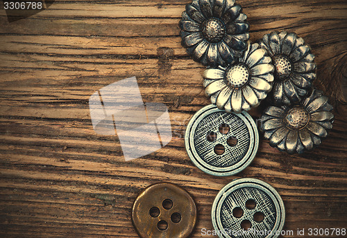 Image of several vintage metal buttons