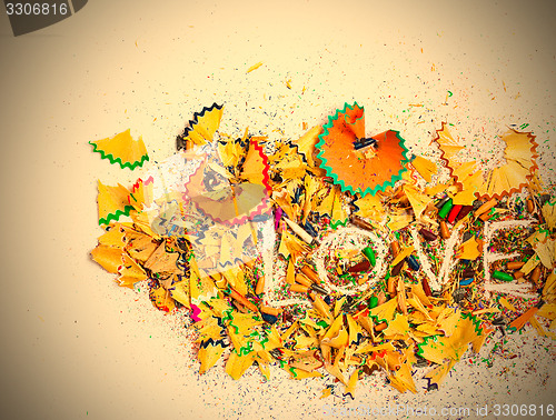 Image of word Love over a shavings