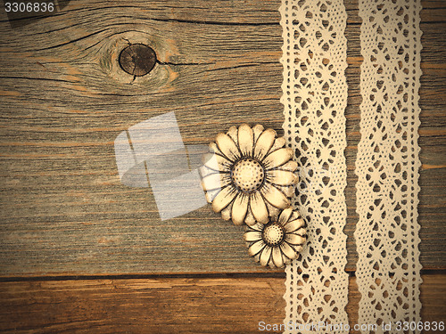 Image of vintage metal buttons flowers and lace ribbons