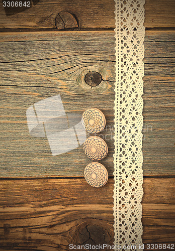 Image of Three vintage bone buttons and lace tape