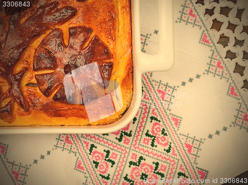 Image of Kulebyaka. cabbage pie on the embroidered cloth