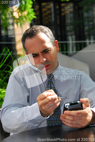 Image of Businessman busy