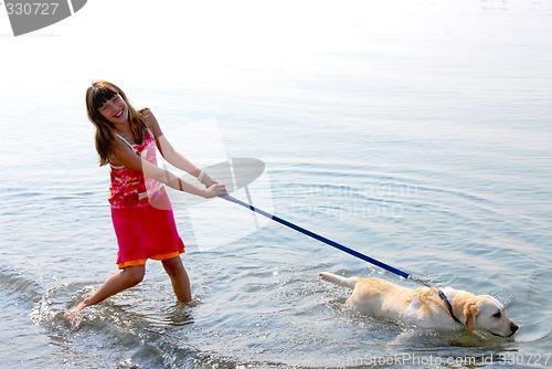 Image of Girl playing dog