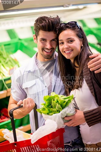 Image of couple shopping in a supermarket