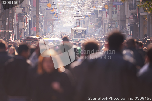 Image of people crowd walking on street