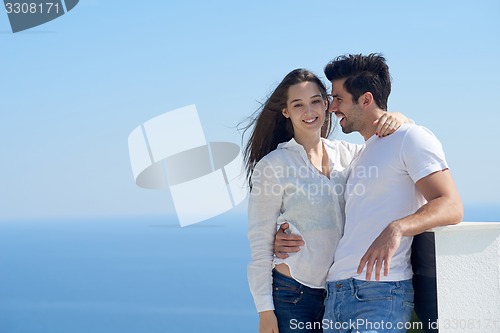 Image of happy young romantic couple have fun arelax  relax at home