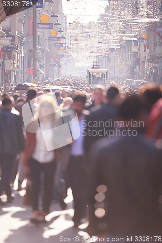 Image of people crowd walking on street