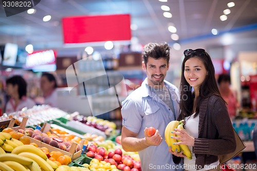 Image of couple shopping in a supermarket