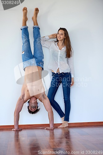 Image of happy young romantic couple have fun arelax  relax at home