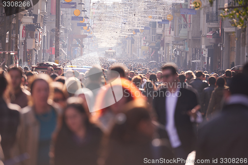 Image of people crowd walking on street
