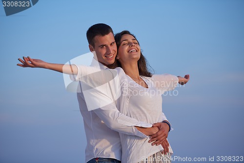 Image of happy young romantic couple have fun arelax  relax at home