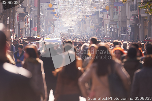 Image of people crowd walking on street