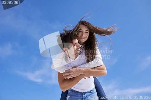 Image of happy young romantic couple have fun arelax  relax at home