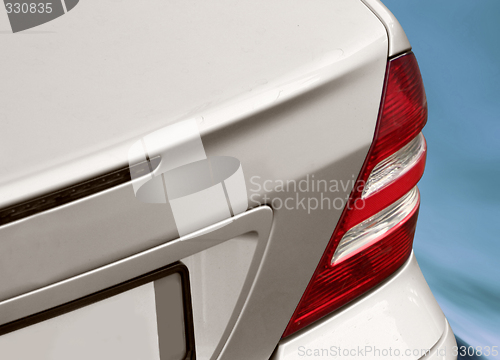 Image of Closeup image of a silver mercedes