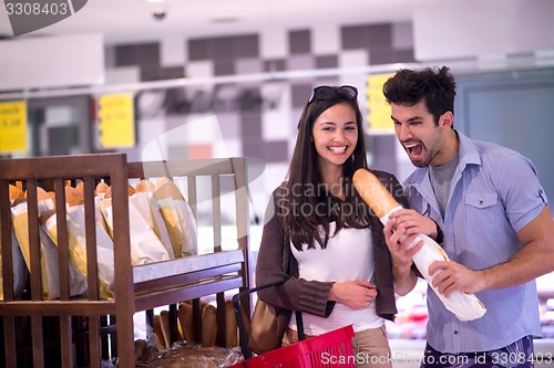 Image of couple shopping in a supermarket