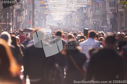 Image of people crowd walking on street