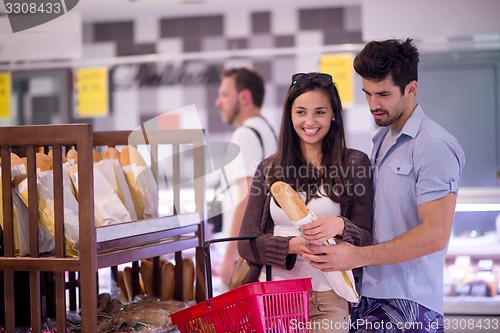 Image of couple shopping in a supermarket