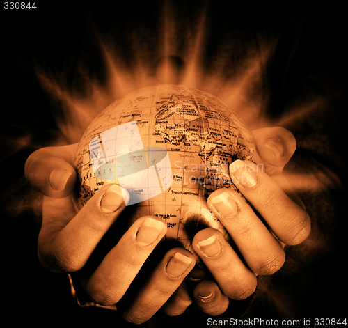 Image of Globe in a girl's hands