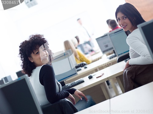 Image of students with teacher  in computer lab classrom