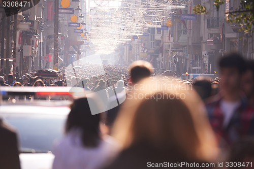 Image of people crowd walking on street