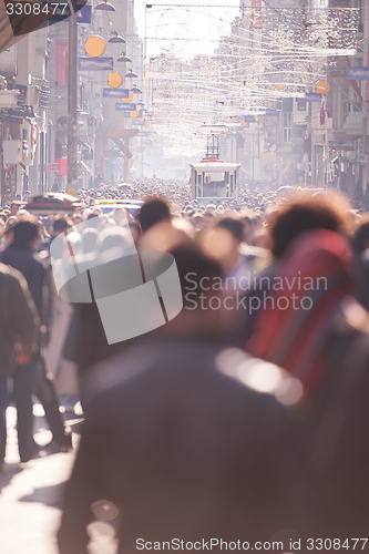 Image of people crowd walking on street