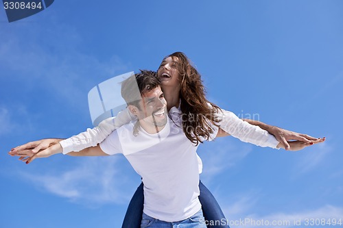 Image of happy young romantic couple have fun arelax  relax at home