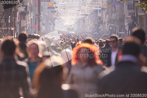 Image of people crowd walking on street