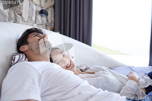 Image of couple relax and have fun in bed