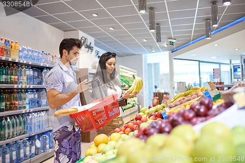 Image of couple shopping in a supermarket