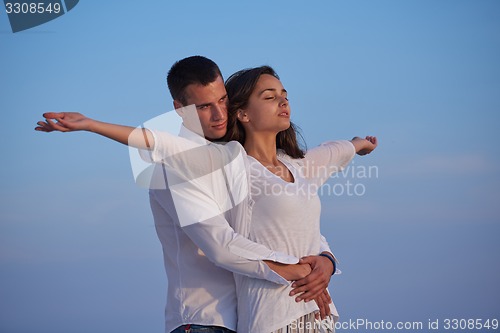 Image of happy young romantic couple have fun arelax  relax at home