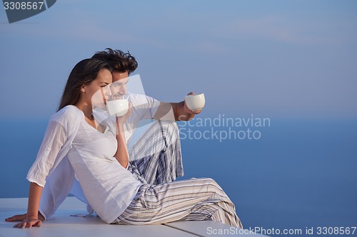 Image of happy young romantic couple have fun arelax  relax at home