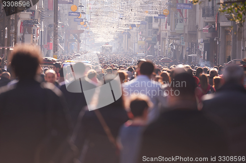 Image of people crowd walking on street