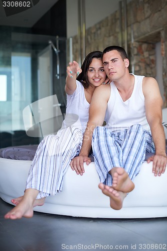 Image of couple relax and have fun in bed