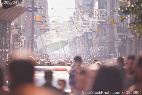 Image of people crowd walking on street