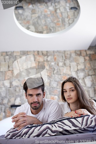 Image of couple relax and have fun in bed