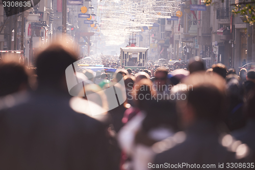 Image of people crowd walking on street