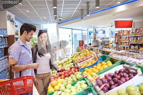 Image of couple shopping in a supermarket