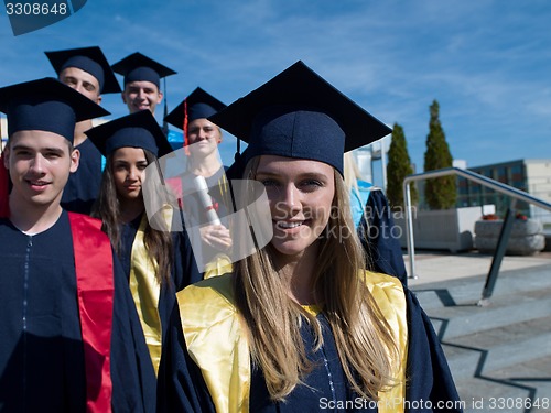 Image of young graduates students group