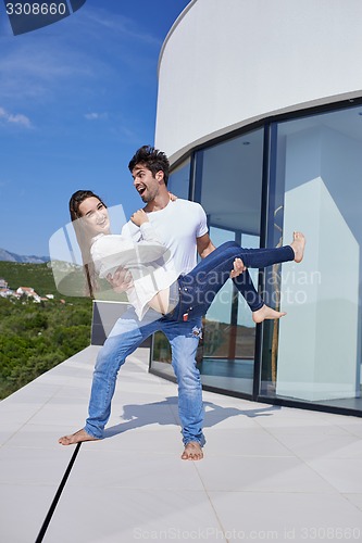 Image of happy young romantic couple have fun arelax  relax at home