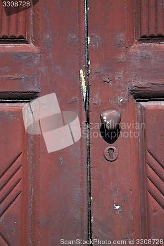 Image of  brass brown knocker and wood   vinago  varese italy