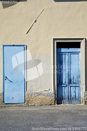 Image of abstract in venegono  the old  wall  and church door  