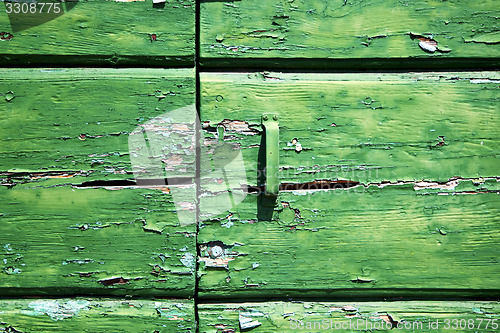 Image of   closed wood door  lonate ceppino varese italy