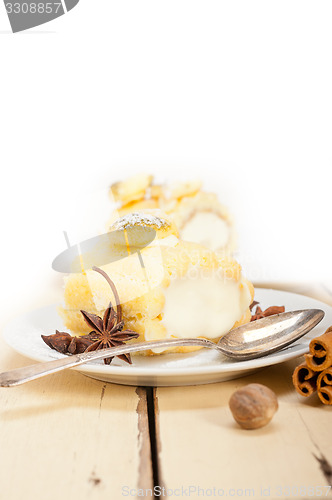 Image of cream roll cake dessert and spices 