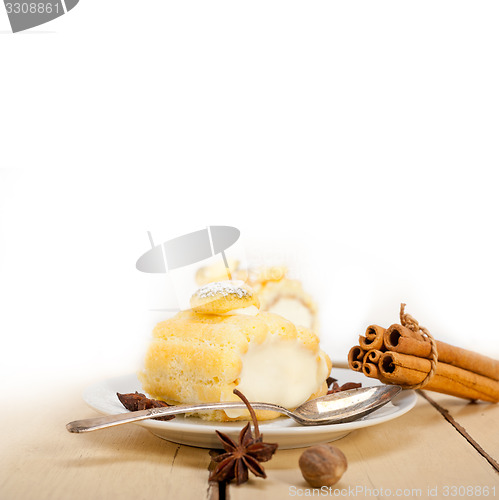 Image of cream roll cake dessert and spices 