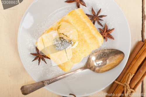 Image of cream roll cake dessert and spices 