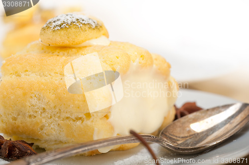 Image of cream roll cake dessert and spices 