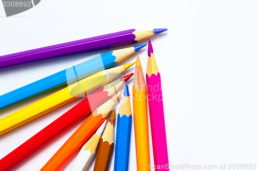 Image of colored pencils on white background