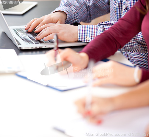 Image of Man hands on a keyboard