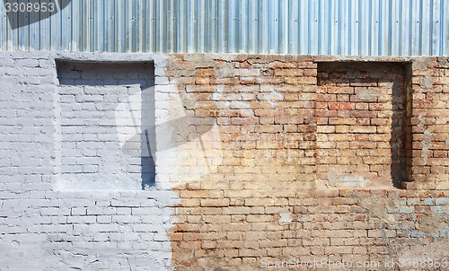 Image of old brick wall with blind windows